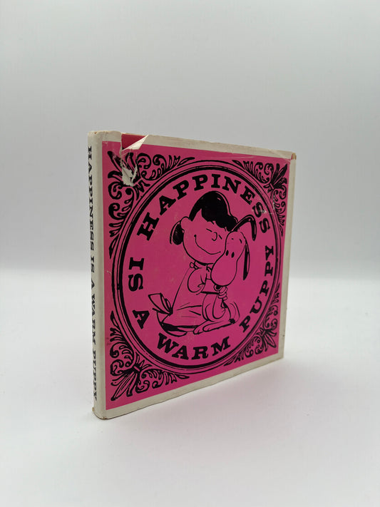Happiness is a Warm Puppy, first edition of first Peanuts collecton