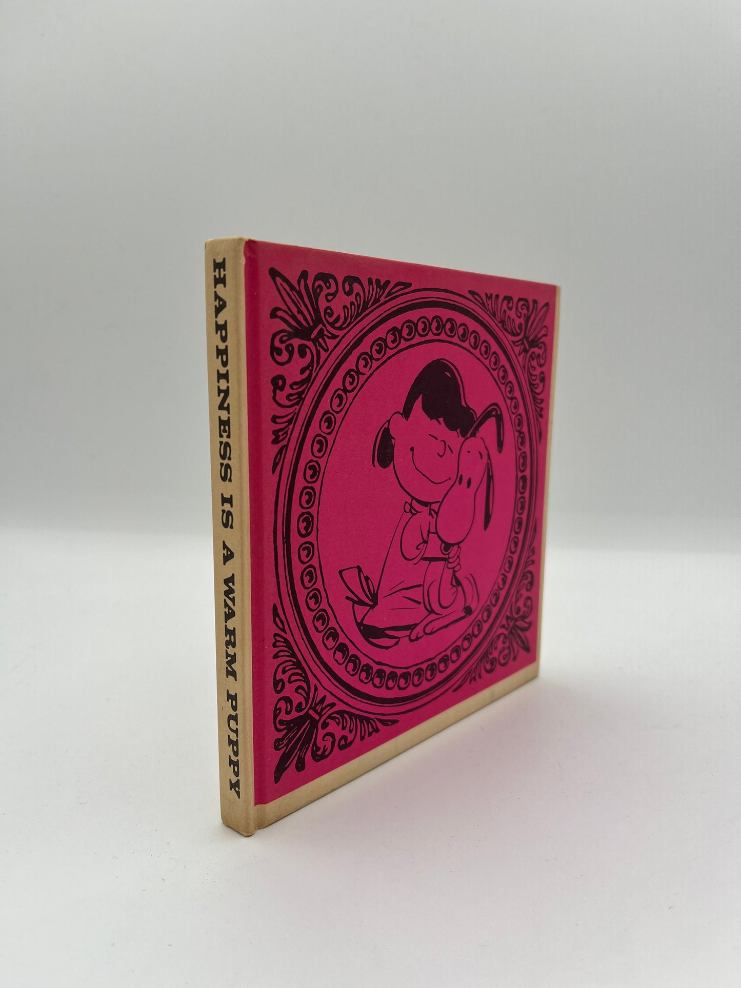 Happiness is a Warm Puppy, first edition of first Peanuts collecton